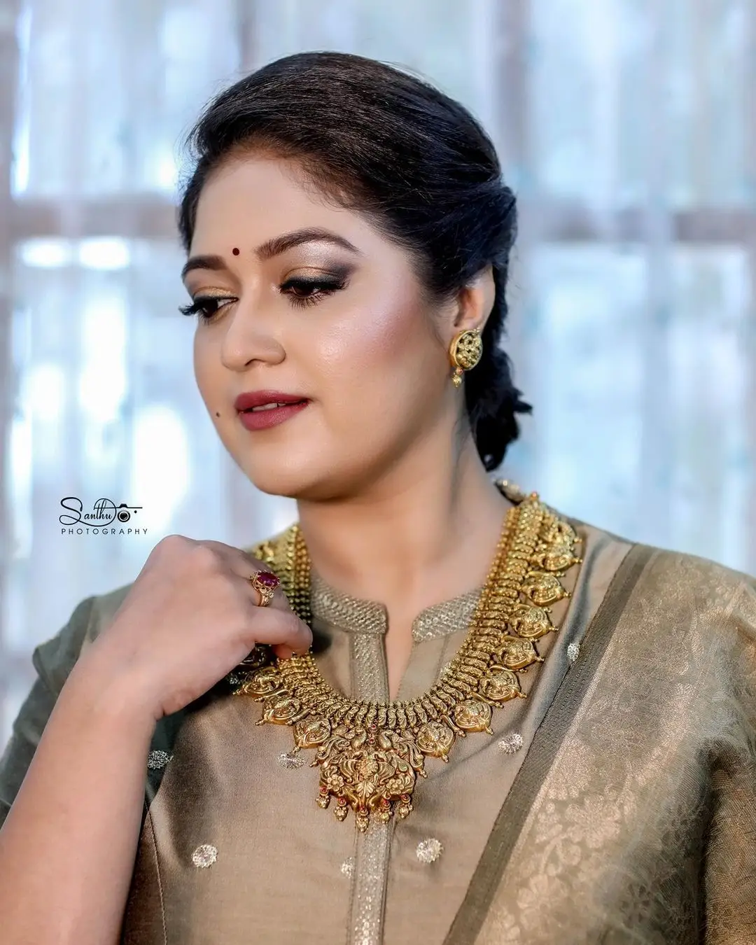 Meghana Raj Stills in Beautiful Earring Jewellery Green Gown